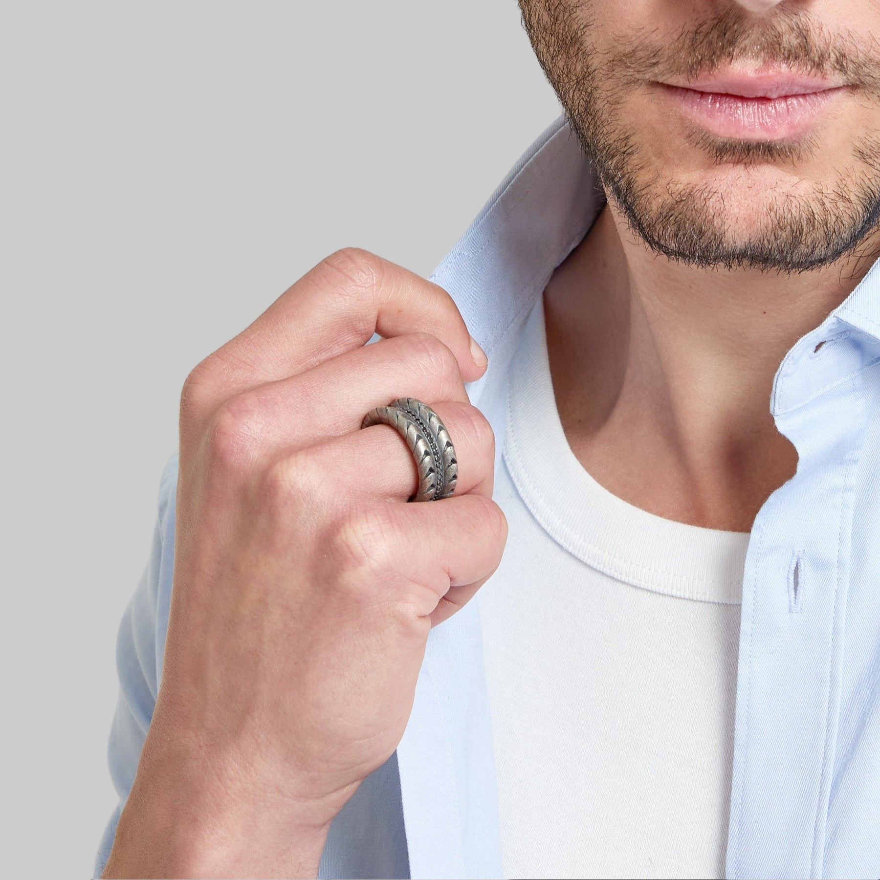 Model wearing Iron Snake Pave Ring in oxidized silver.