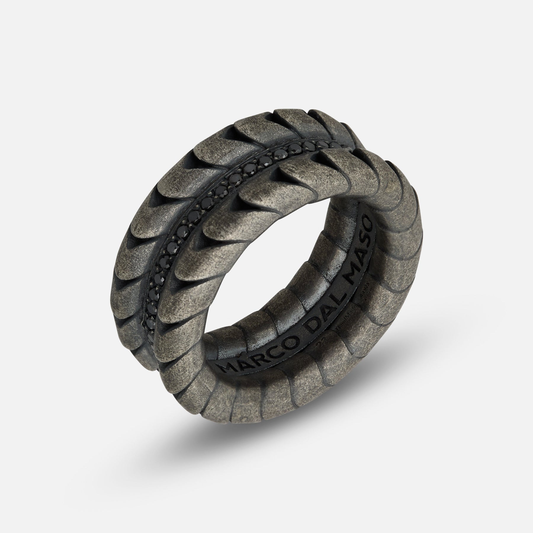 Close-up of Iron Snake Pave Ring in oxidized silver with black diamonds.