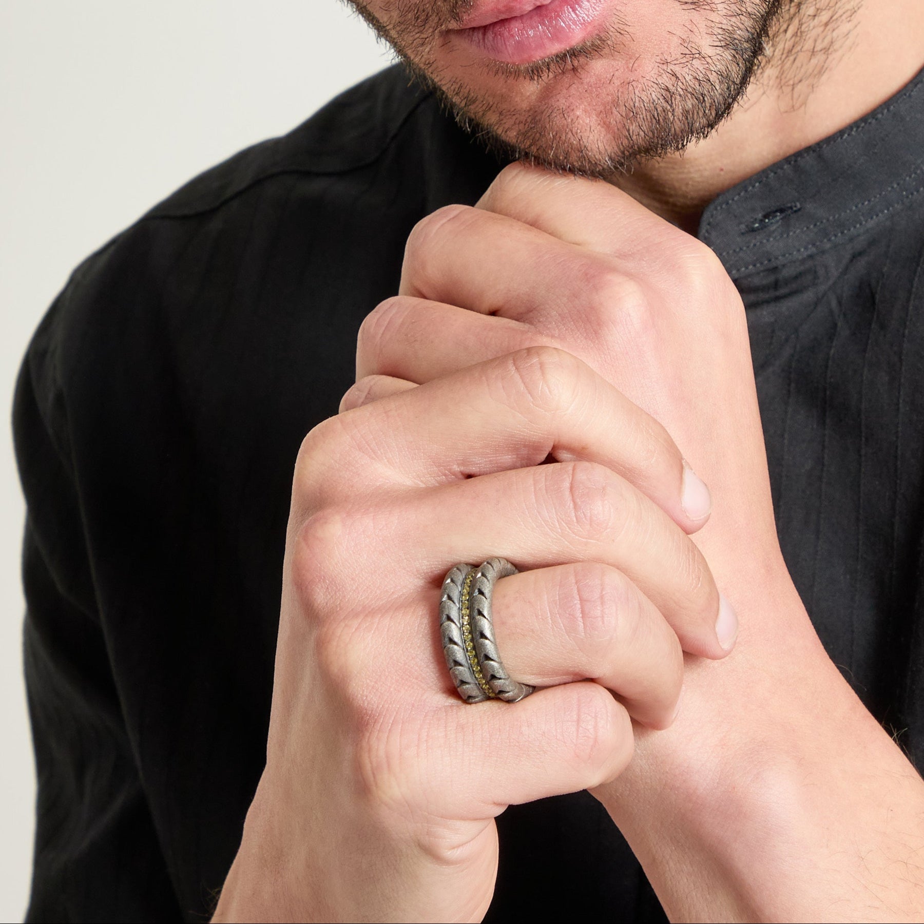 Model wearing Iron Snake Pave Ring set with yellow sapphires.