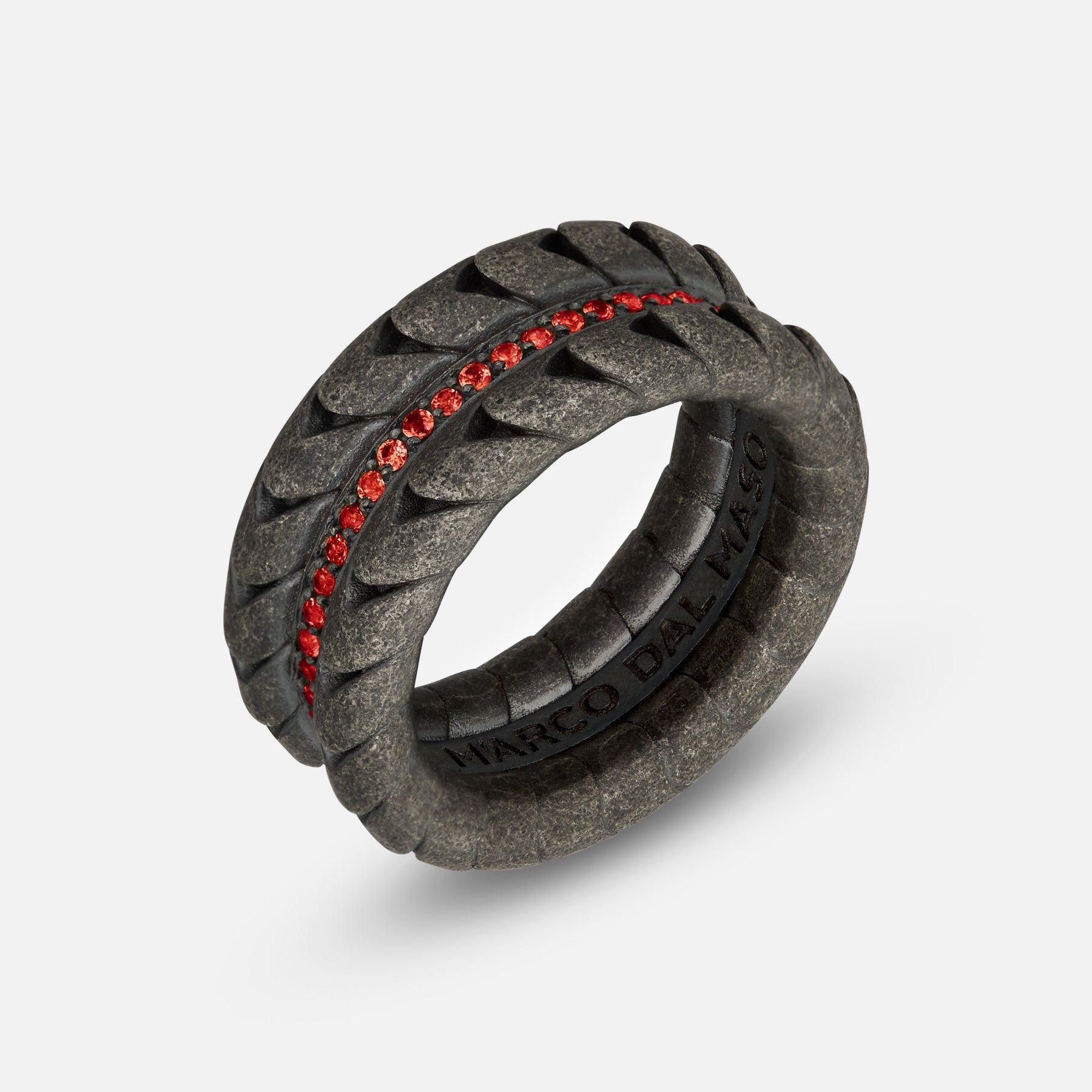 Close-up of Iron Snake Pave Ring in oxidized silver with red sapphires.