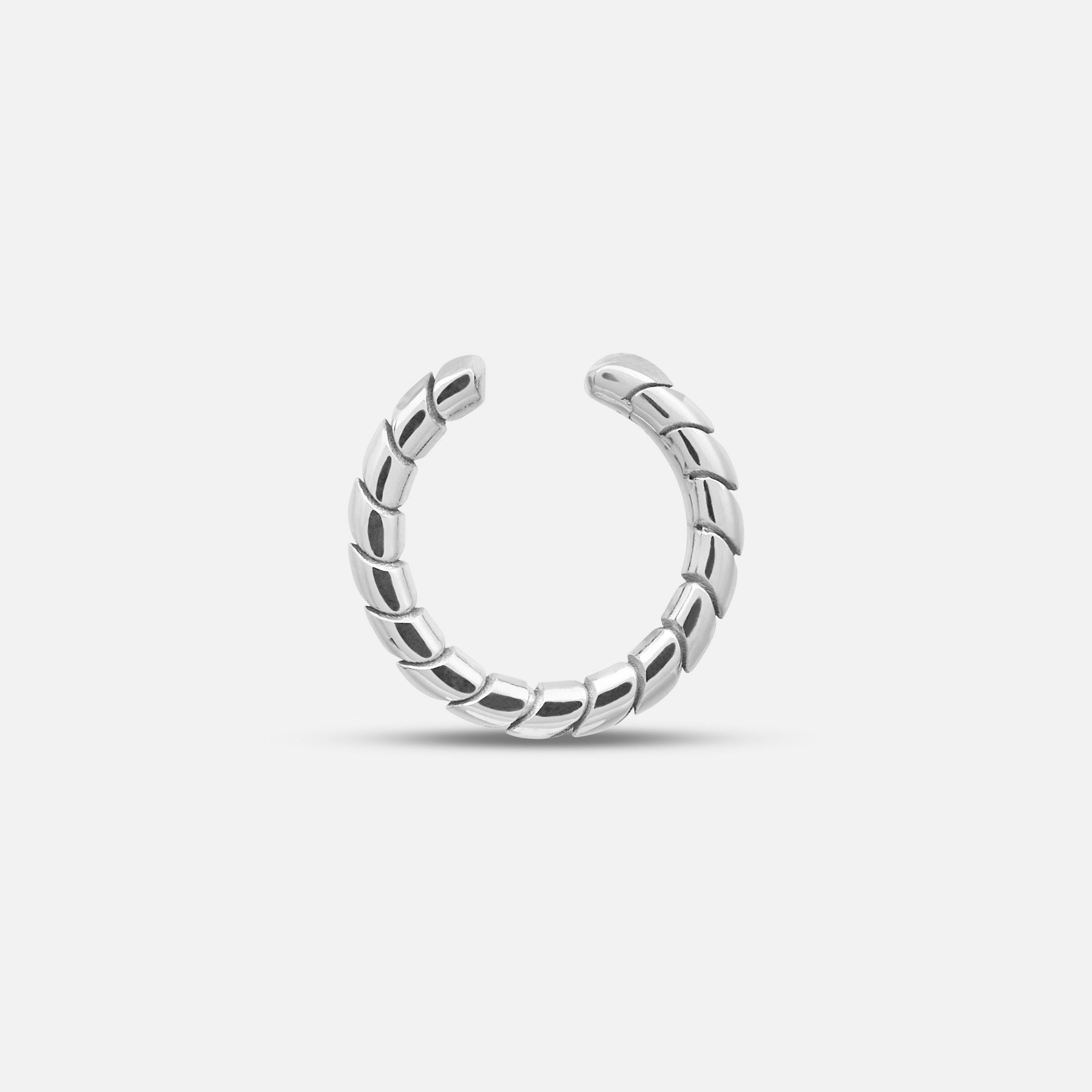 Side view of polished silver Iron Snake Slender Ear Cuff showing slim profile.
