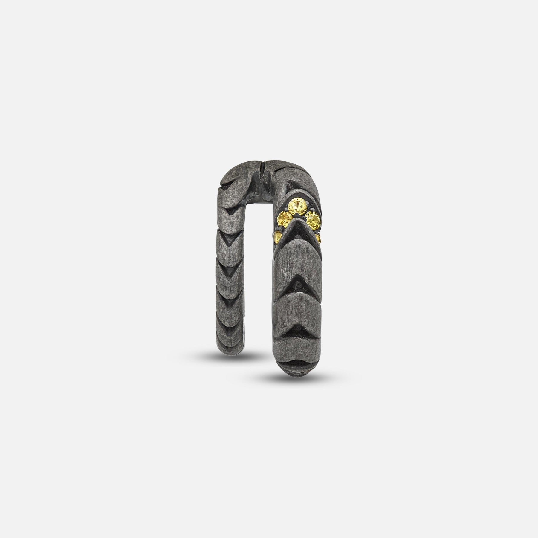 Front view of oxidized silver Iron Snake ear cuff showing Pave yellow sapphire detail.