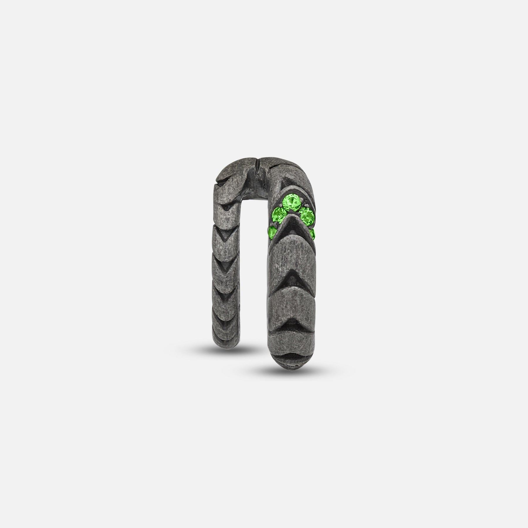 Front view of oxidized silver Iron Snake ear cuff showing Pave tsavorite detail.