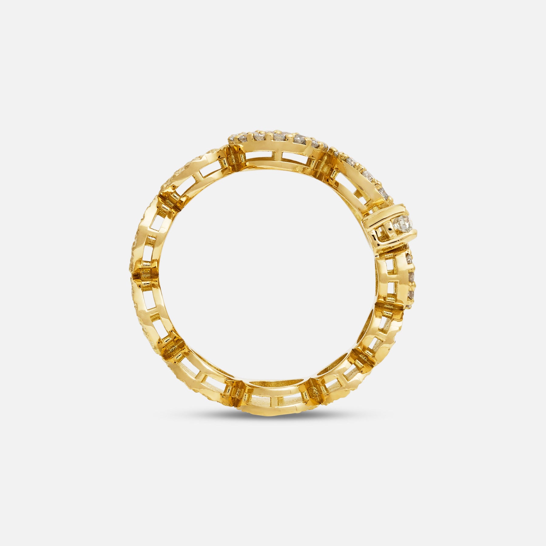 Frammenti Ring in 18K yellow gold with matte finish and pavé-set white diamonds, showcasing sculptural circular design details.