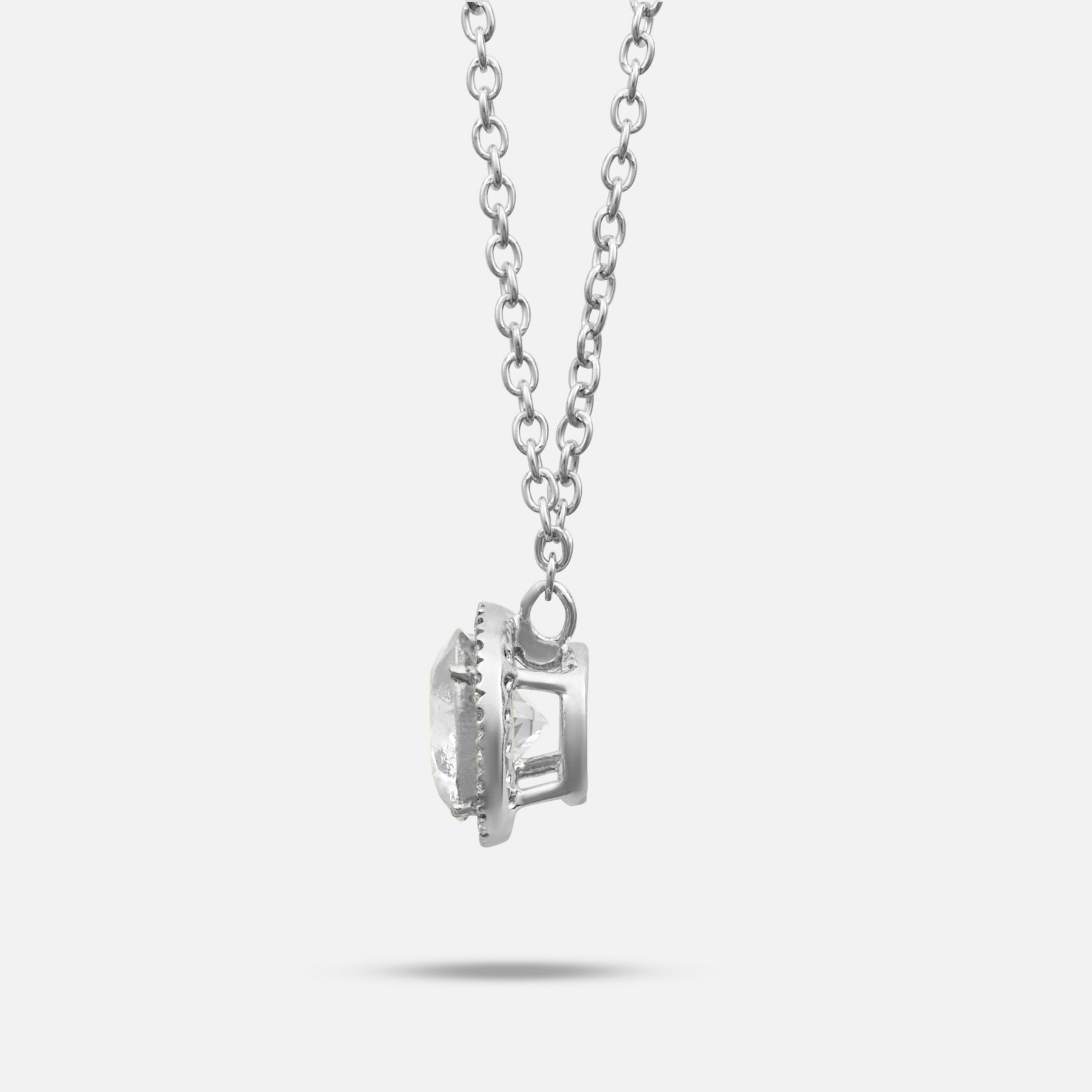 White Diamond setting on Eclipse Luna Halo Pendant shown at angle