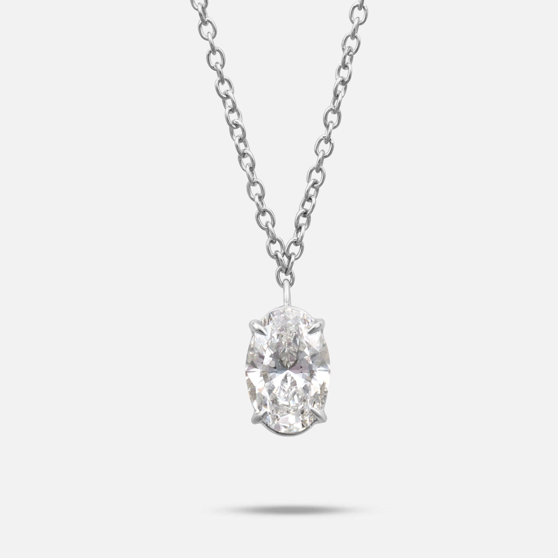 Close-up of white diamond details on Eclipse Vesper Pendant