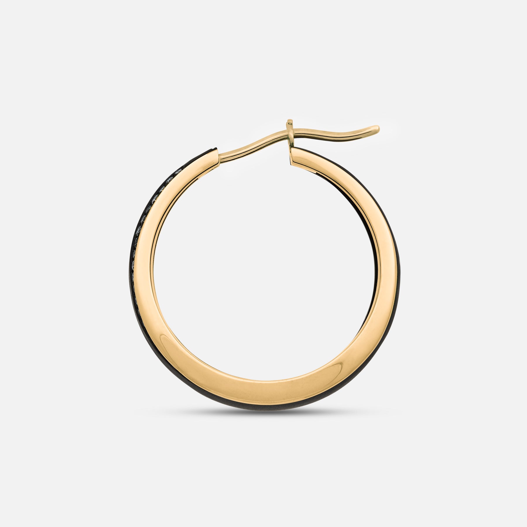 Close-up of white diamond details on Eclipse Dawn Hoops