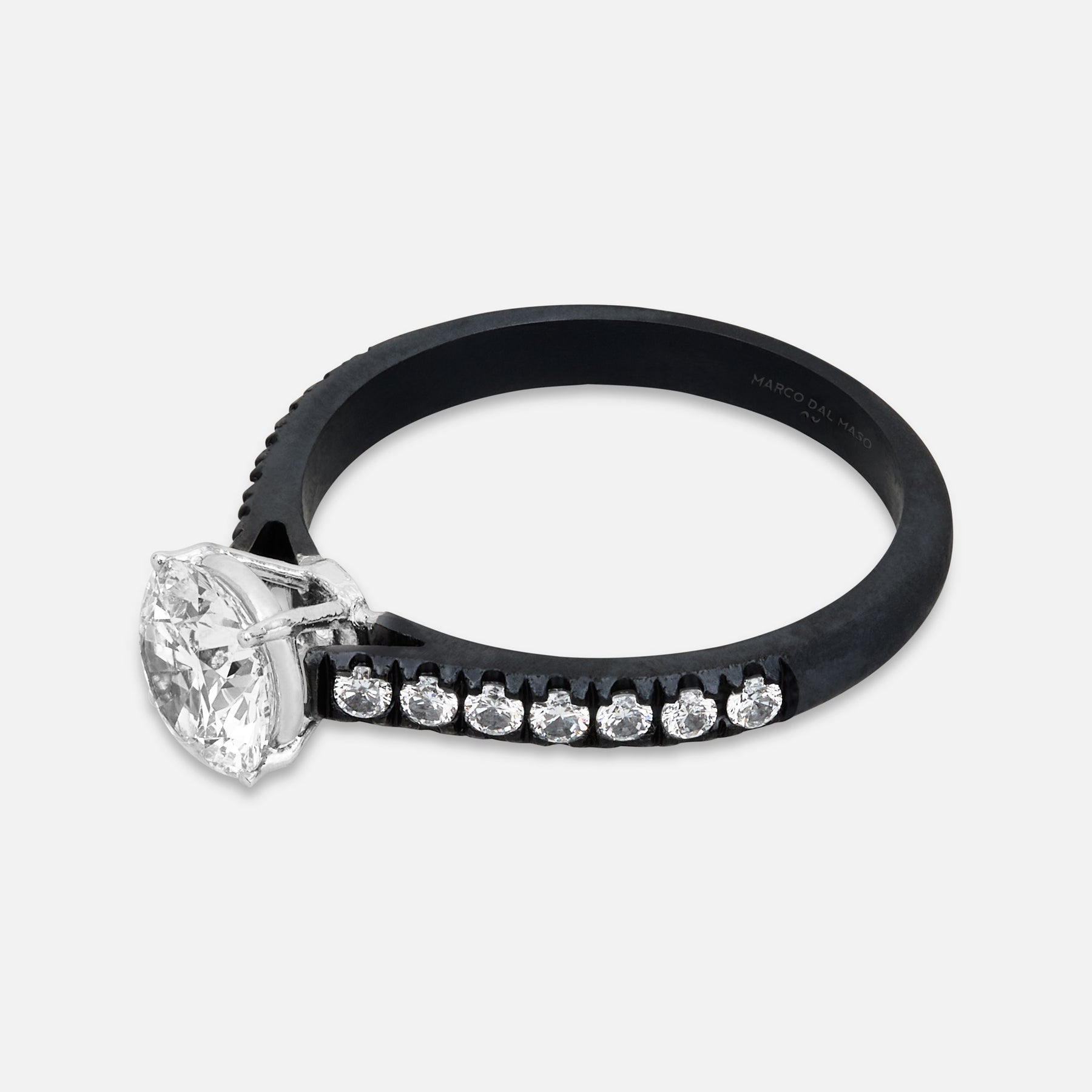 Close-up of white diamond details on Eclipse Luna Ring