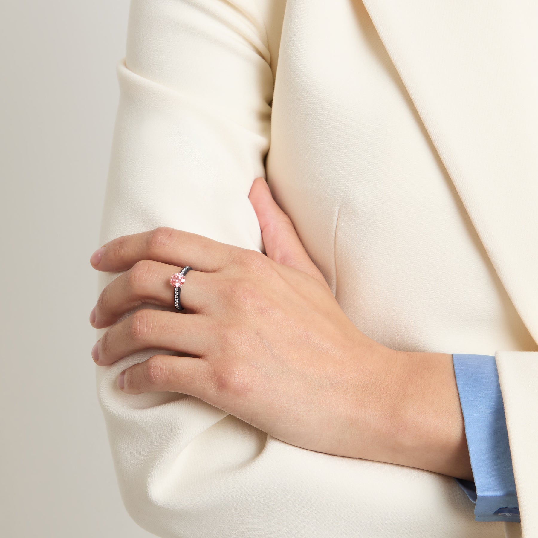 Eclipse Luna Ring worn alone by model against neutral background