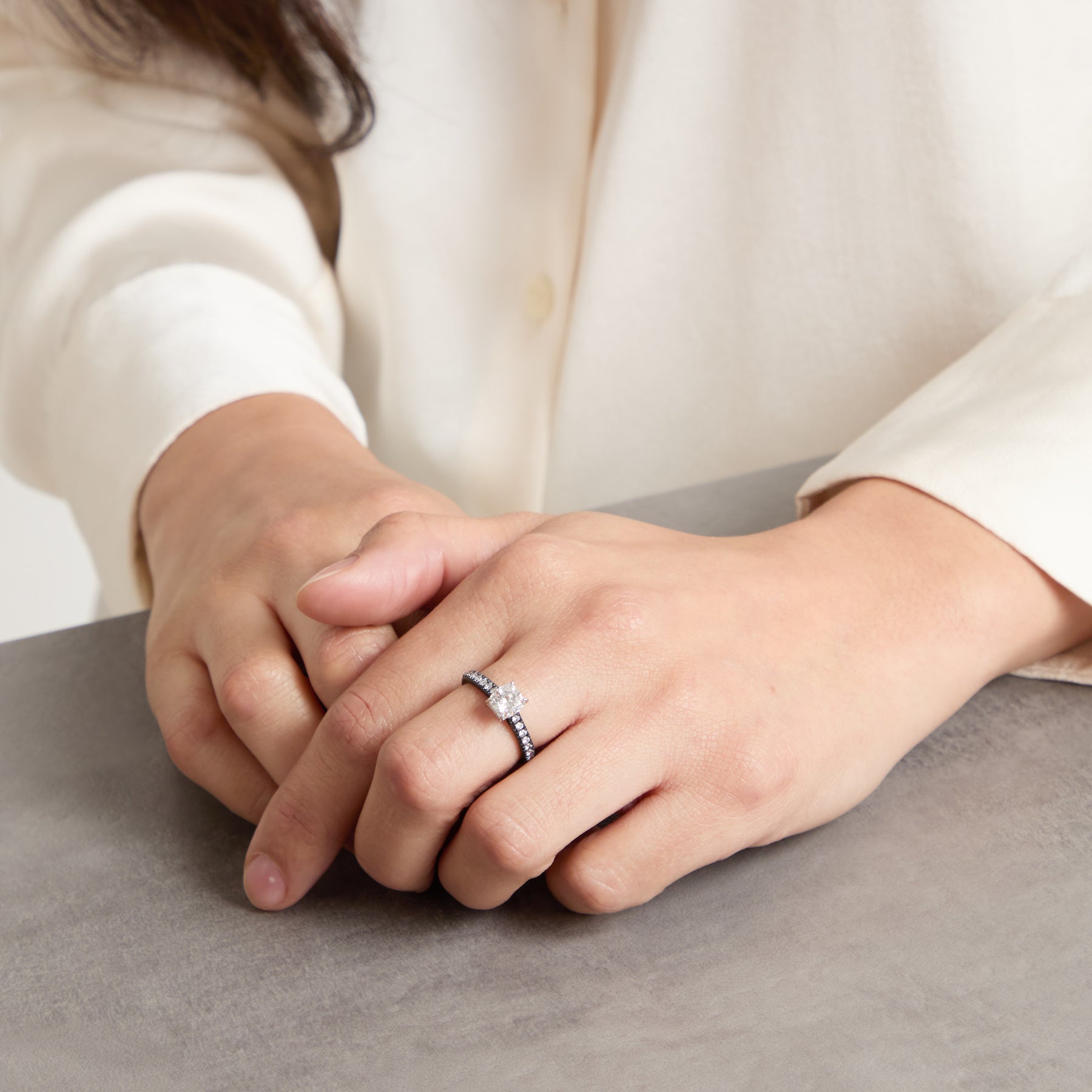 Model wearing Eclipse Celeste Ring shown in styled position