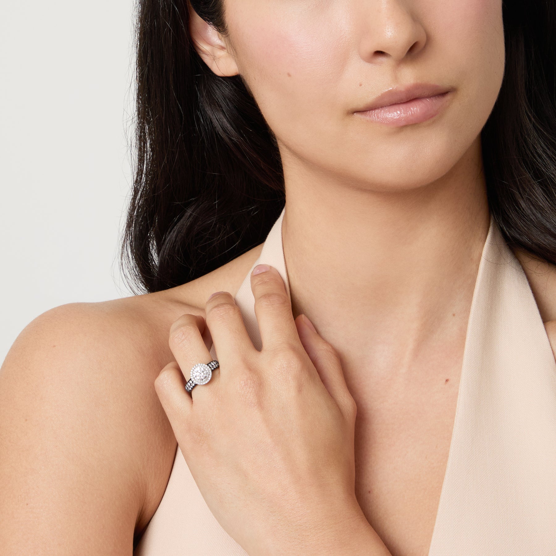 Eclipse Luna Starburst Ring worn alone by model against neutral background