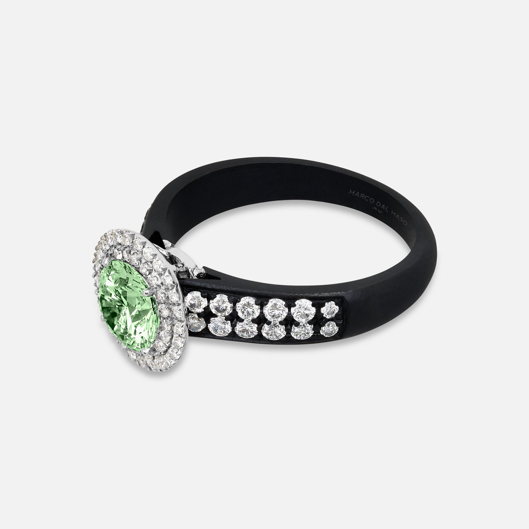 Close-up of green diamond details on Eclipse Luna Starburst Ring