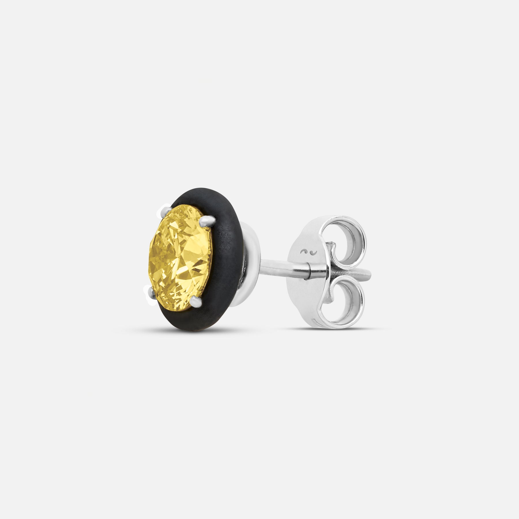 Close-up of yellow diamond details on Eclipse Black Luna Earrings