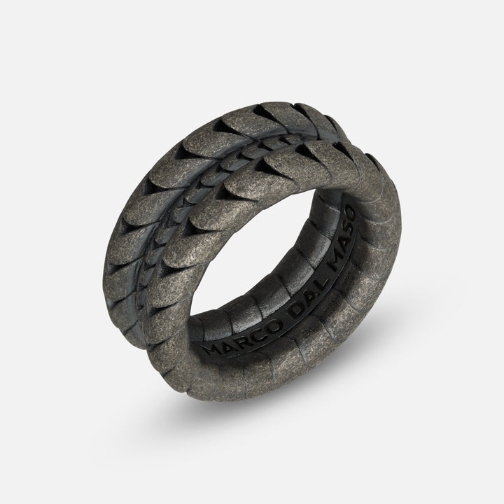 Iron Snake ring in oxidized silver on a neutral background.