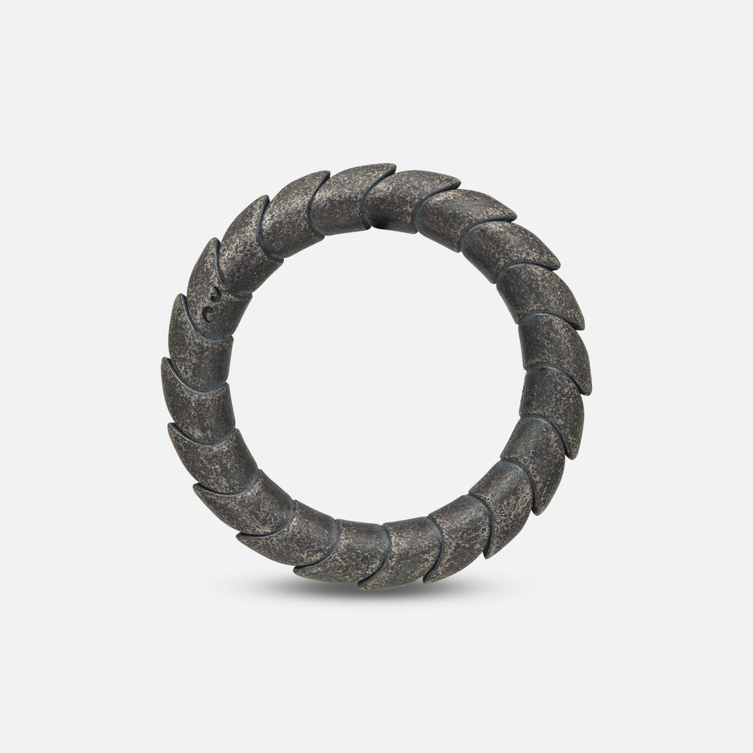 Side angle of slender oxidized silver ring from Iron Snake collection