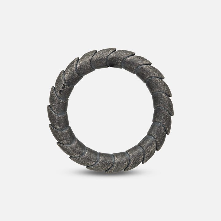 Side angle of slender oxidized silver ring from Iron Snake collection