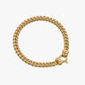 A gold Cuban link bracelet with a matte finish and a bold, chunky design.