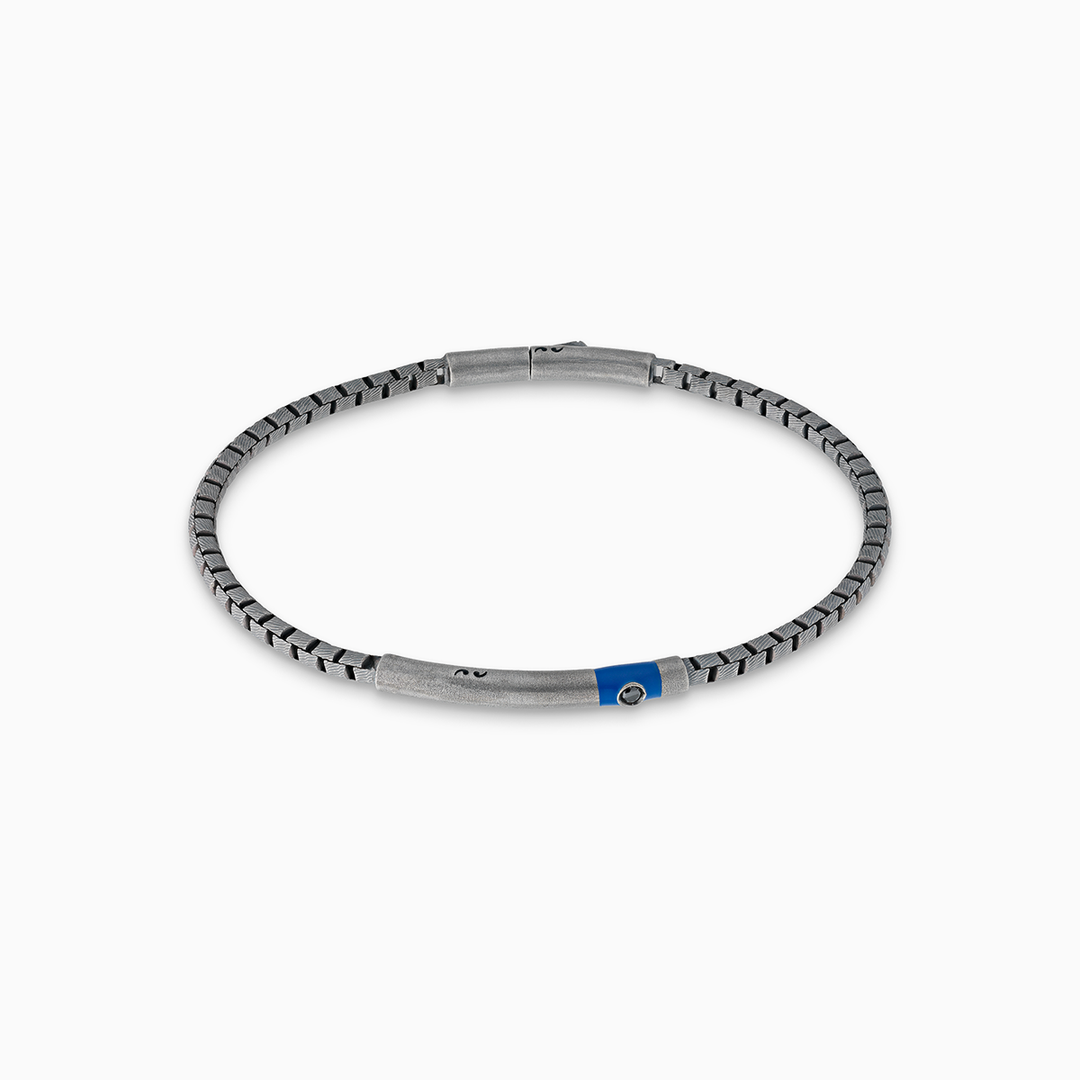 Bracciale Ulisse intagliato tubolare ossidato con diamante nero e smalto blu