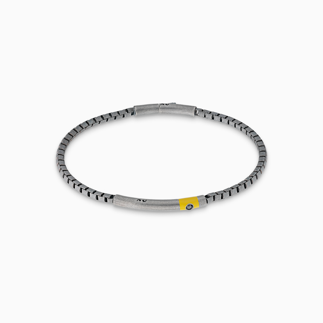 Bracciale ULISSE intagliato tubolare ossidato con diamante nero e smalto giallo