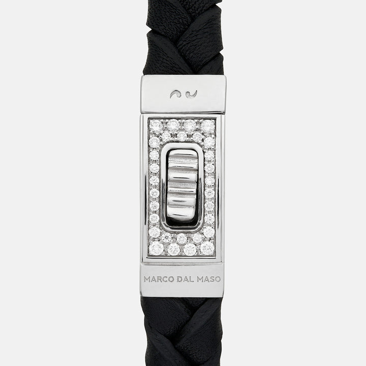 Close-up of Gladiator polished silver bracelet featuring lab-grown white diamonds and bold black leather - Marco Dal Maso