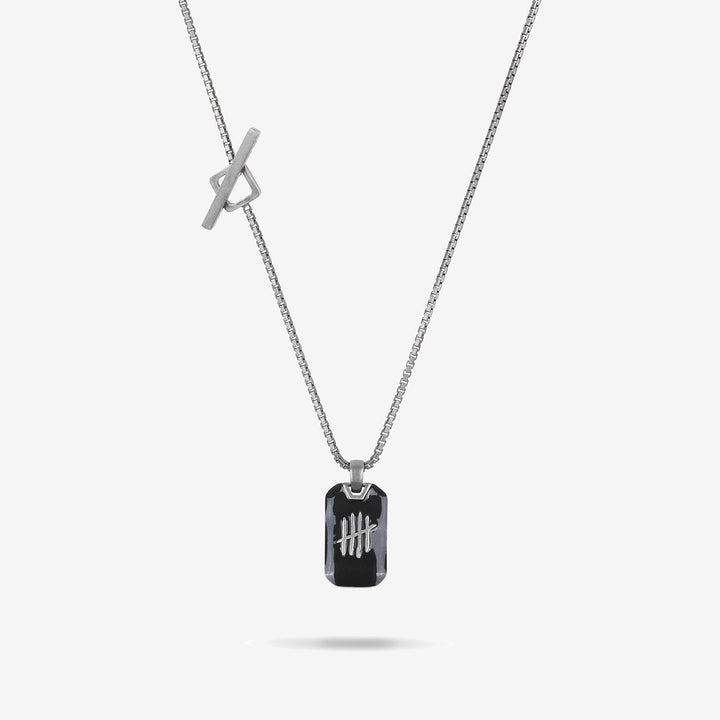 Necklace with a rectangular pendant on a white background