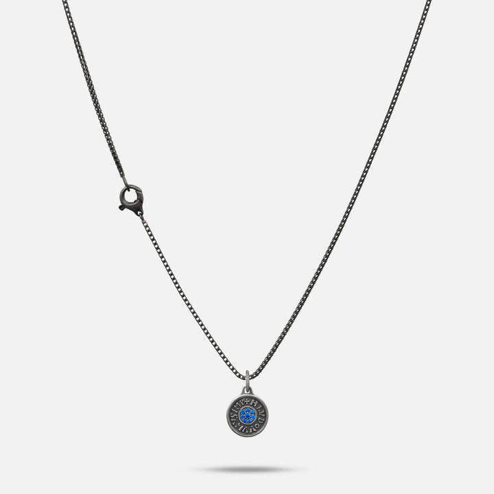 Necklace with a round pendant on a white background