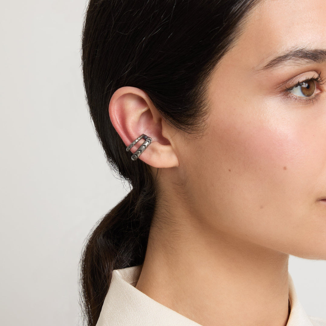 Model wearing Iron Snake Pave Ear Cuff in oxidized silver.
