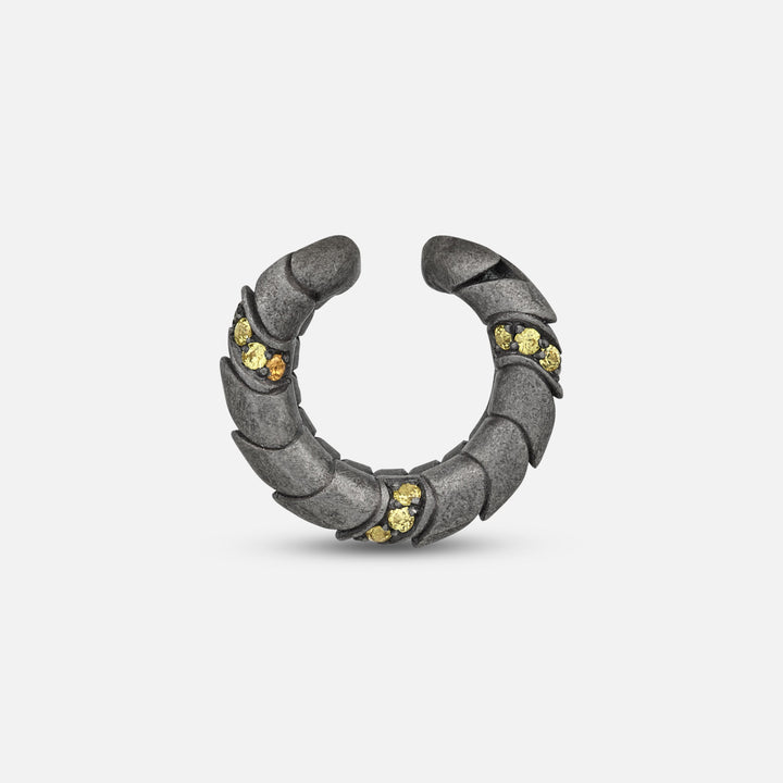 Side view of oxidized silver Iron Snake ear cuff showing Pave yellow sapphire detail.