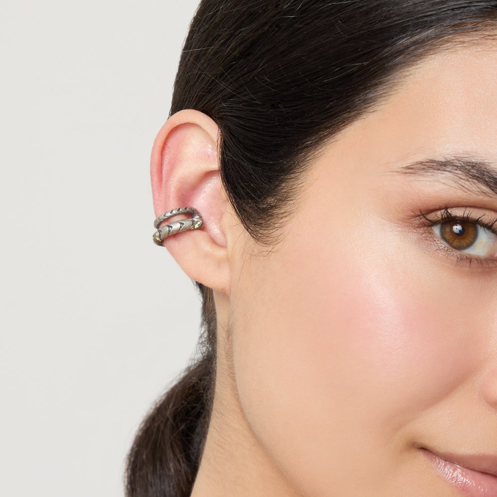 Model wearing Iron Snake Pavé Ear Cuff with yellow sapphires.