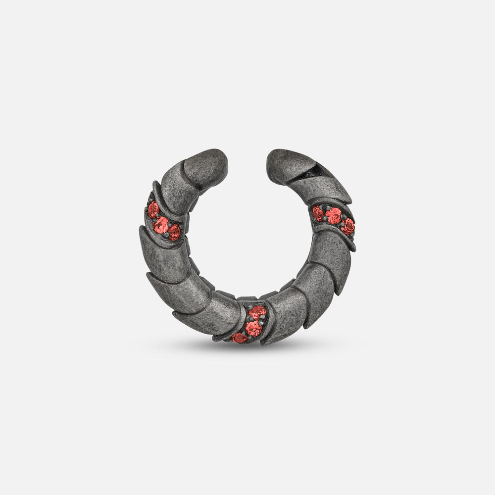 Side view of oxidized silver Iron Snake ear cuff showing Pavé red sapphire detail.