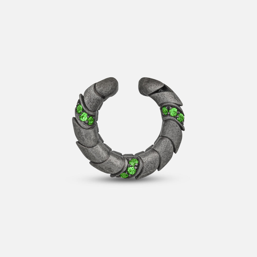 Side view of oxidized silver Iron Snake ear cuff showing Pavé tsavorite detail.