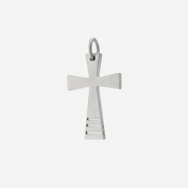 Silver cross pendant on a white background