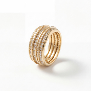 Gold ring with diamond accents on a white background