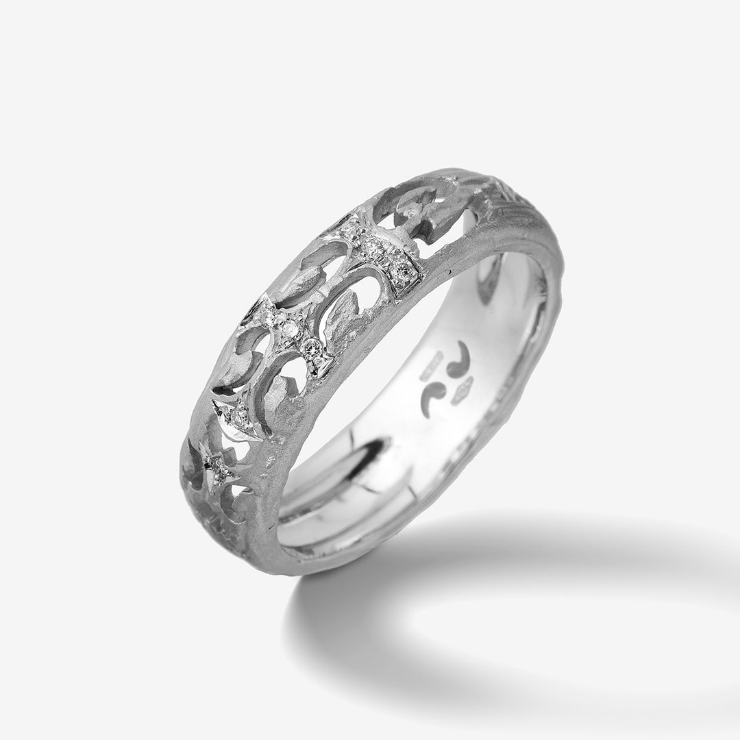 Silver warrior filigree ring by Marco Dal Maso Men featuring intricate metalwork and detailed design on a plain background.