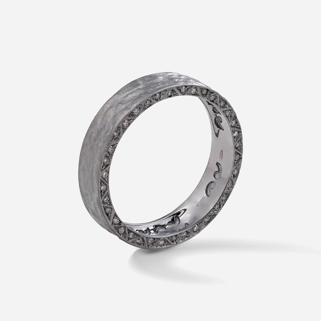 Marco Dal Maso Men Manawa Pave Edge Diamond Ring with sparkling diamonds and sleek band, close-up view showing detailed craftsmanship.