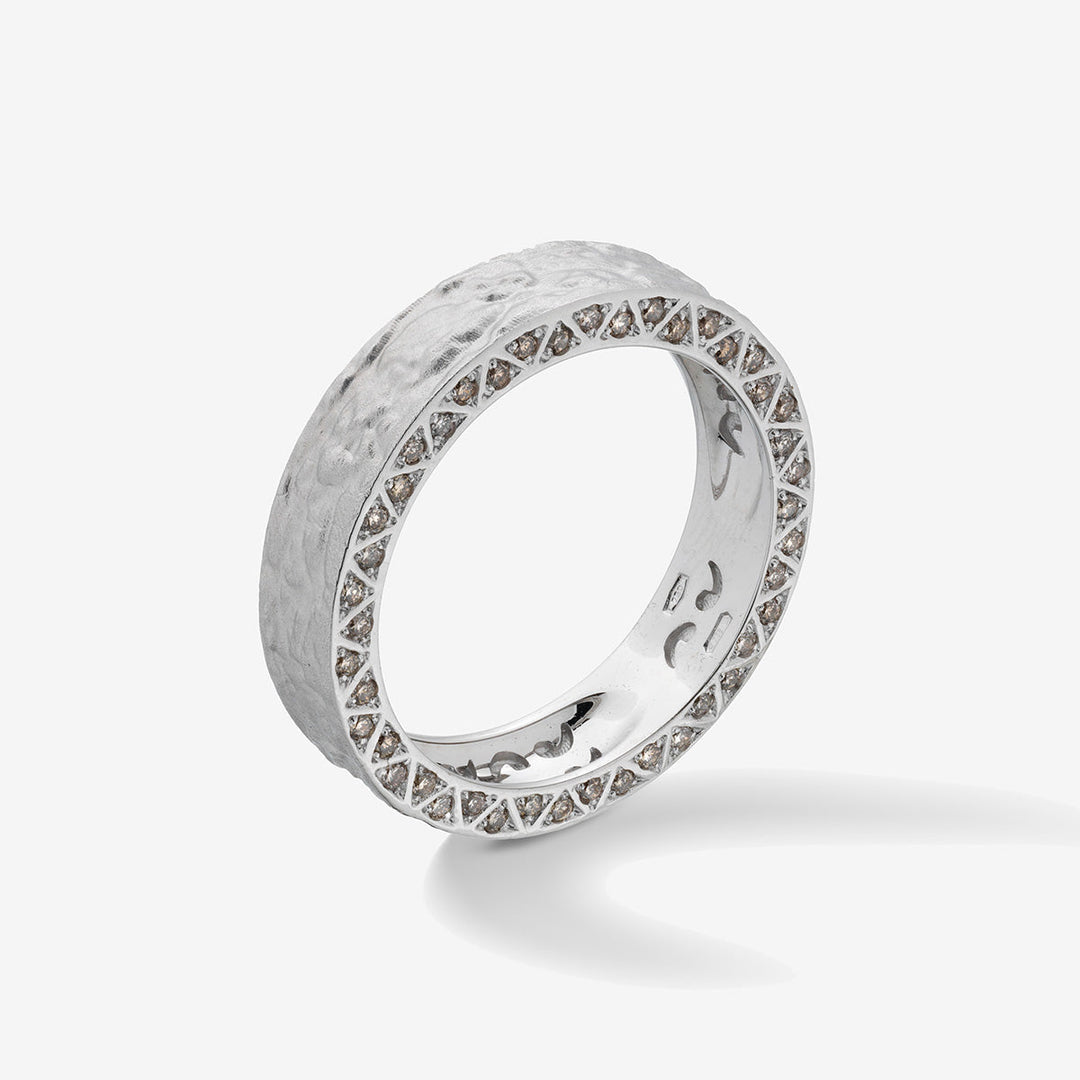 Marco Dal Maso Men MANAWA pavé edge diamond ring with a sleek band and sparkling diamonds on a white background.