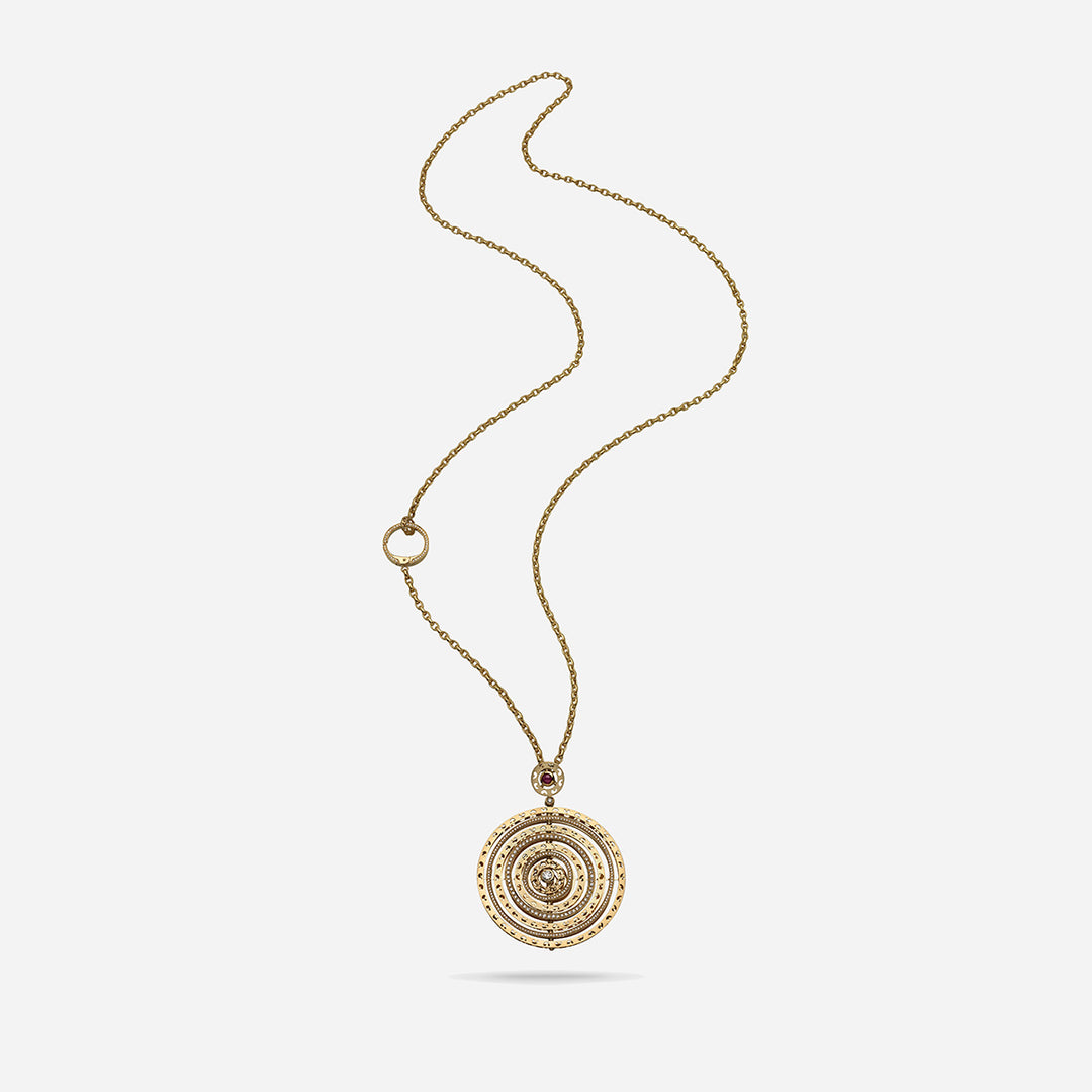 Amaia Twilight Pendant in 18k yellow gold with white diamonds and red sapphire.