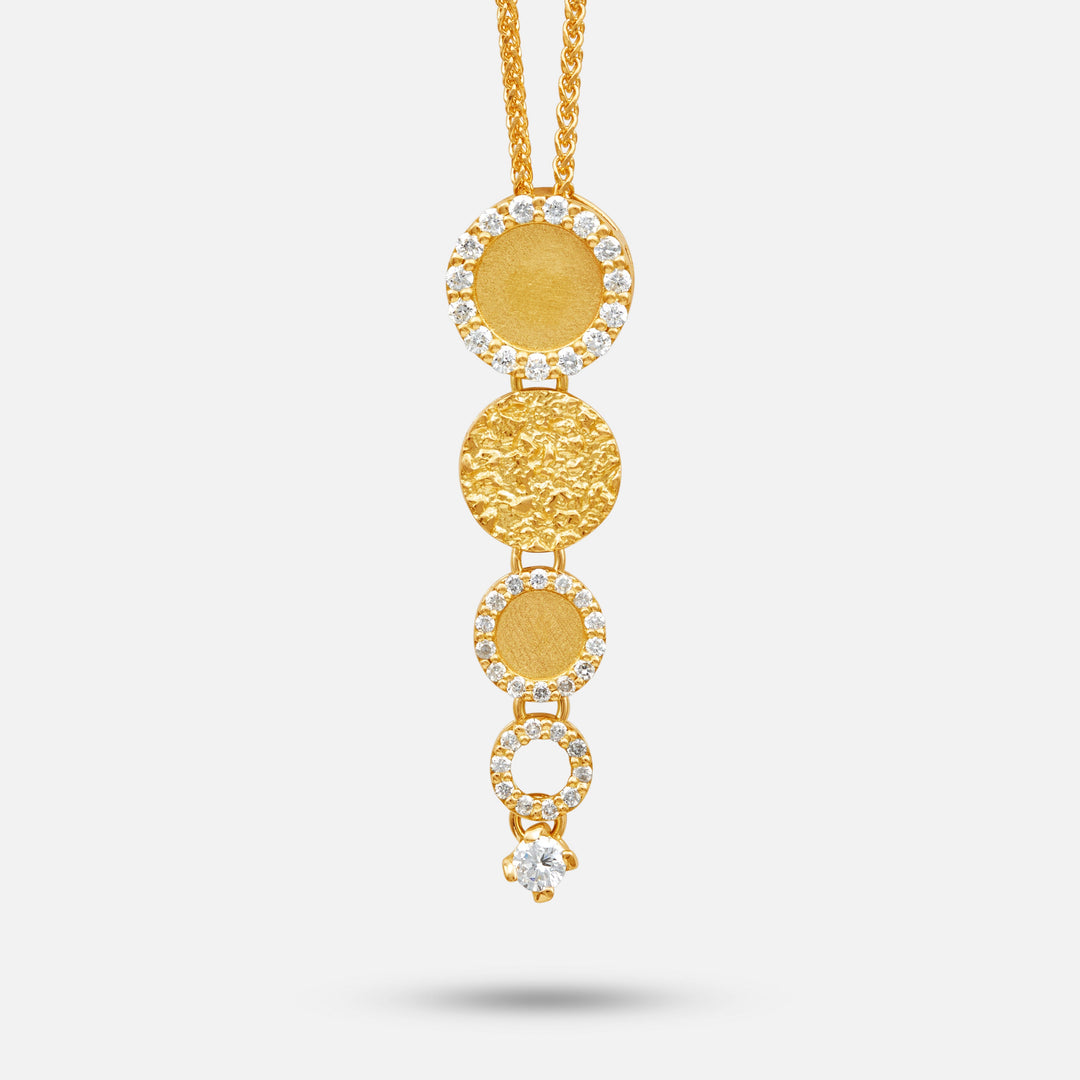 Frammenti Cascade pendant in 18K yellow gold with descending circular diamond‑set discs.