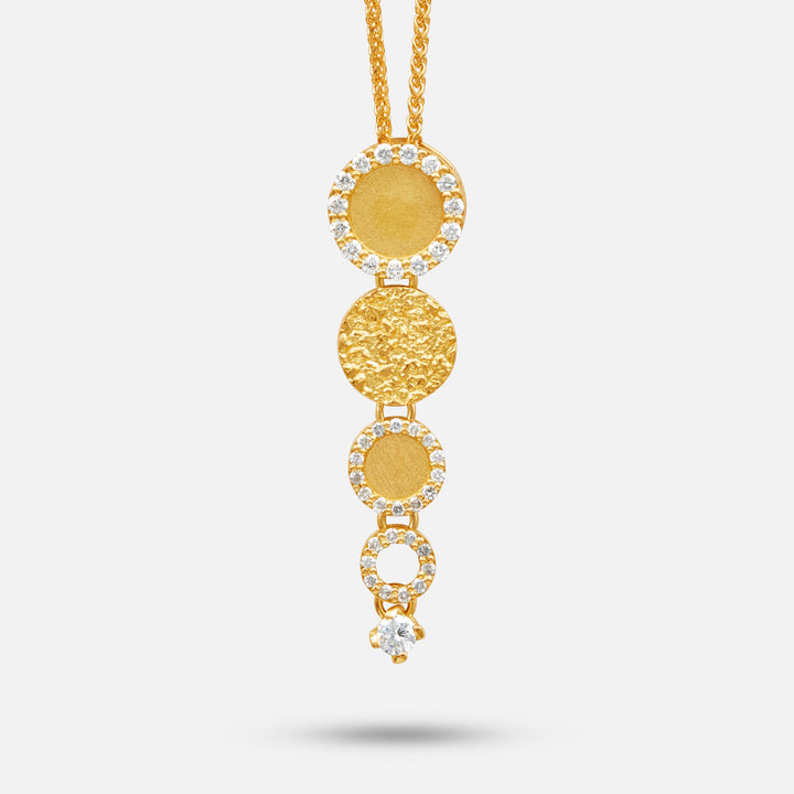 Frammenti Cascade pendant in 18K yellow gold with descending circular diamond‑set discs.