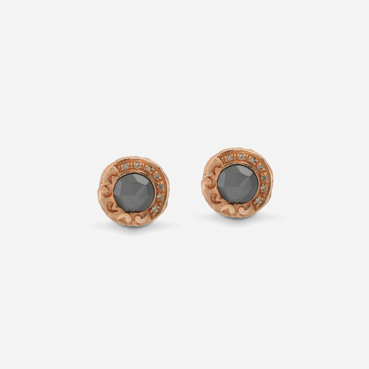 Pair of Warrior medallion stud earrings in rose gold with hematite center and champagne diamond halo
