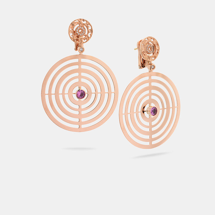 Amaia Centric Twilight Earrings in 18k rose gold with white diamonds and red sapphires.