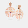 Amaia Centric Twilight Earrings in 18k rose gold with white diamonds and red sapphires.
