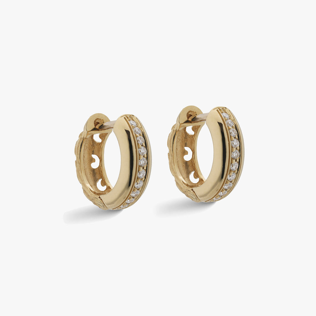 Marco Dal Maso Men Warrior Polished Hoop Earrings, shiny metal earrings with a sleek hoop design, on a plain background.