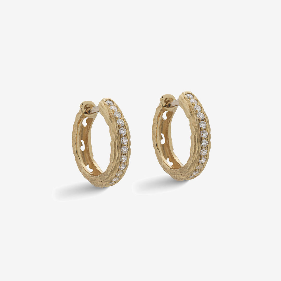 Marco Dal Maso Men ornate hoop earrings featuring intricate warrior design in polished metal, stylish and bold accessory.