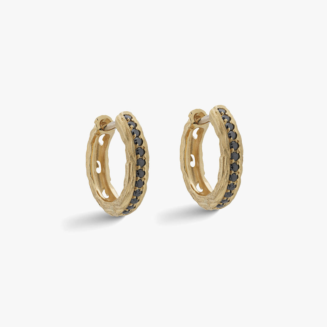 Marco Dal Maso Men Warrior ornate hoop earrings featuring intricate gold-tone design and bold hoop style.