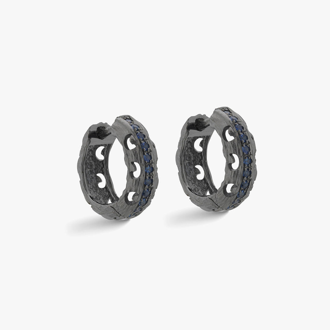 Marco Dal Maso Men carved hoop earrings featuring bold, polished metal design with intricate carved details.