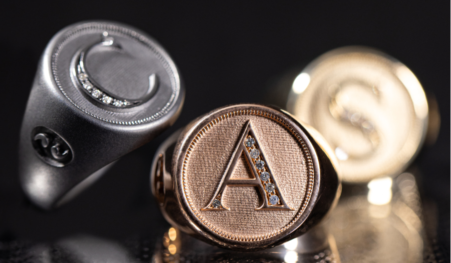 MARCO DAL MASO silver and gold initial rings with diamonds