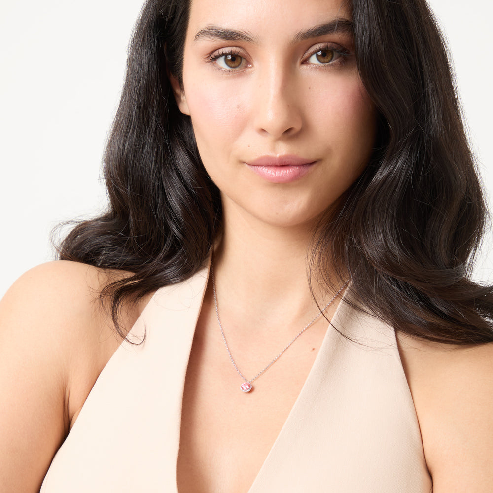 Model wearing Eclipse Luna Halo Pendant shown in styled position