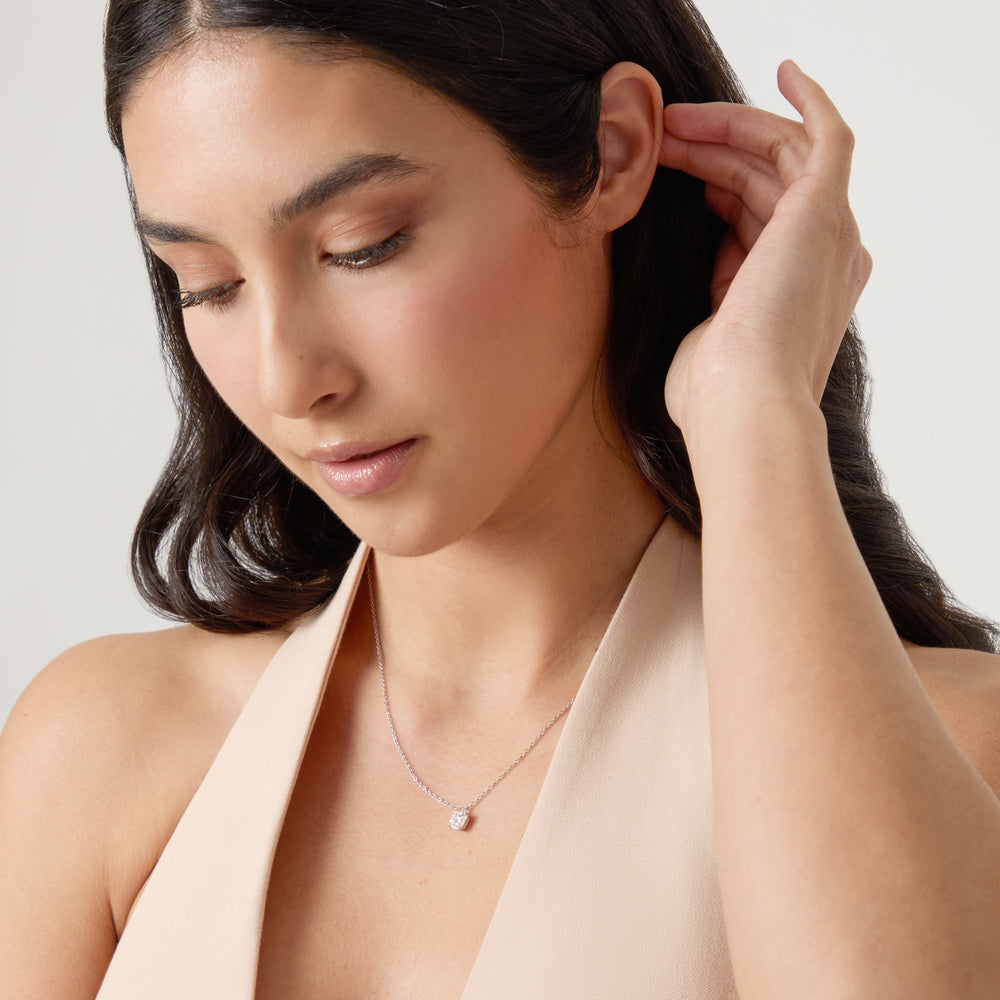 Model wearing Eclipse Celeste Pendant on 45cm chain with pendant resting at collarbone