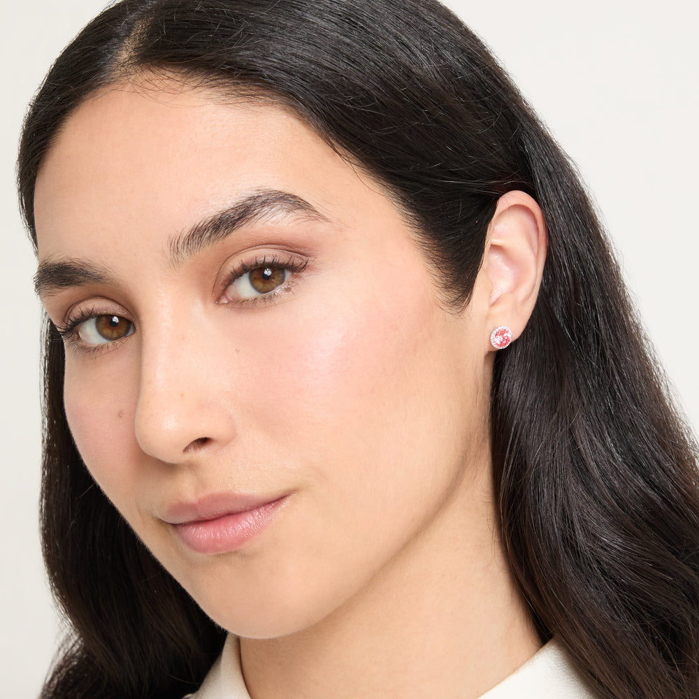 Model wearing Eclipse Luna Halo Earrings shown in styled position